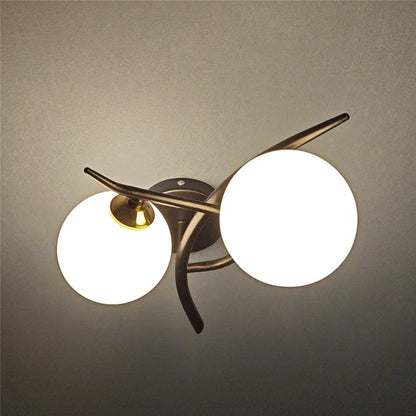 Gold Double Globe Glass Wall Light