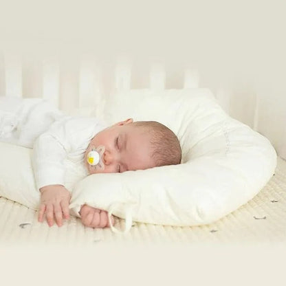 Infant Pillow with Recessed Head Support and Adjustable Side Drawstrings