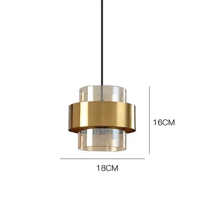 Lampada a sospensione in vetro fumé con dettaglio in metallo color ottone
