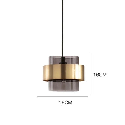Lampada a sospensione in vetro fumé con dettaglio in metallo color ottone