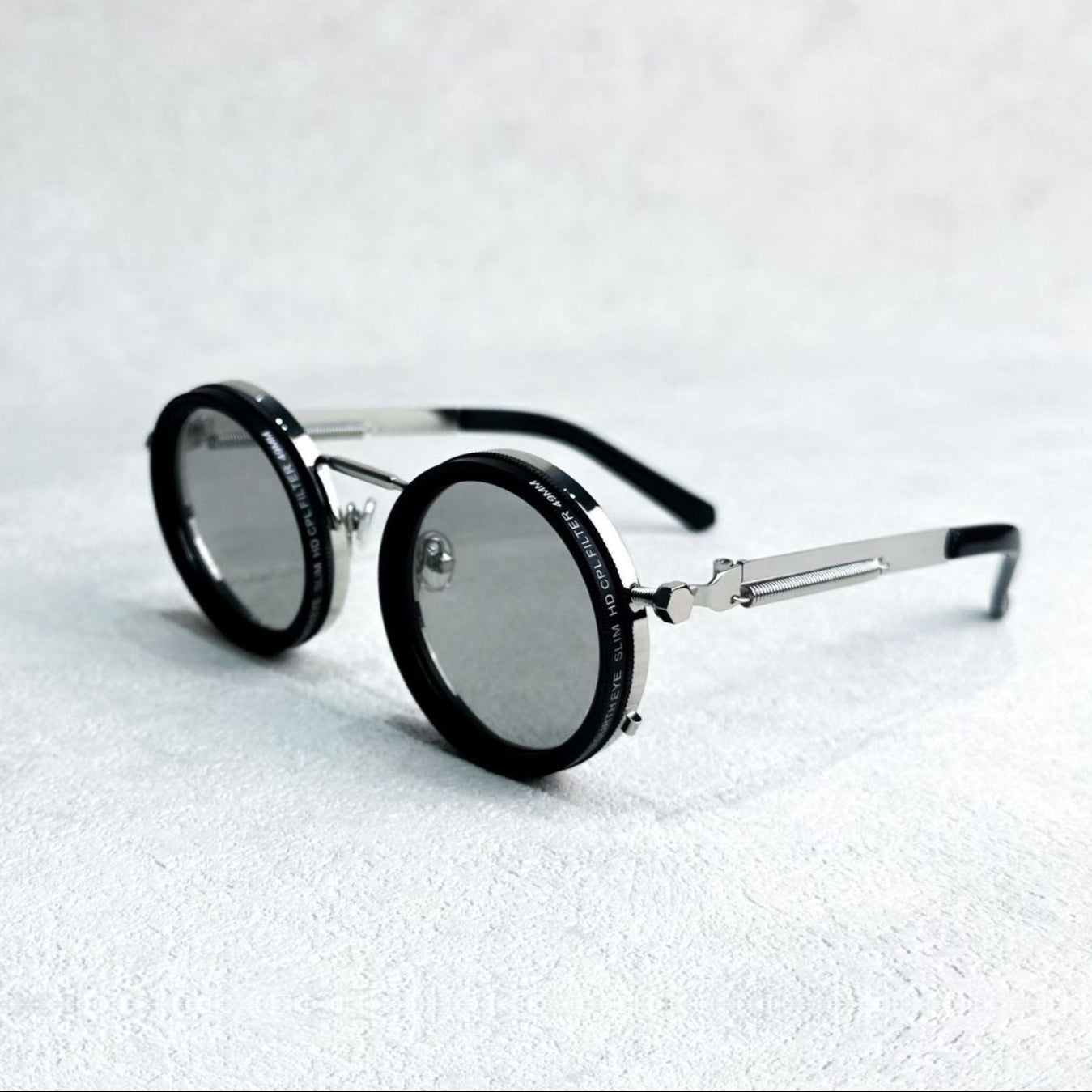 Unisex Polarized Round Sunglasses with Adjustable Light Filter and Metal Frame
