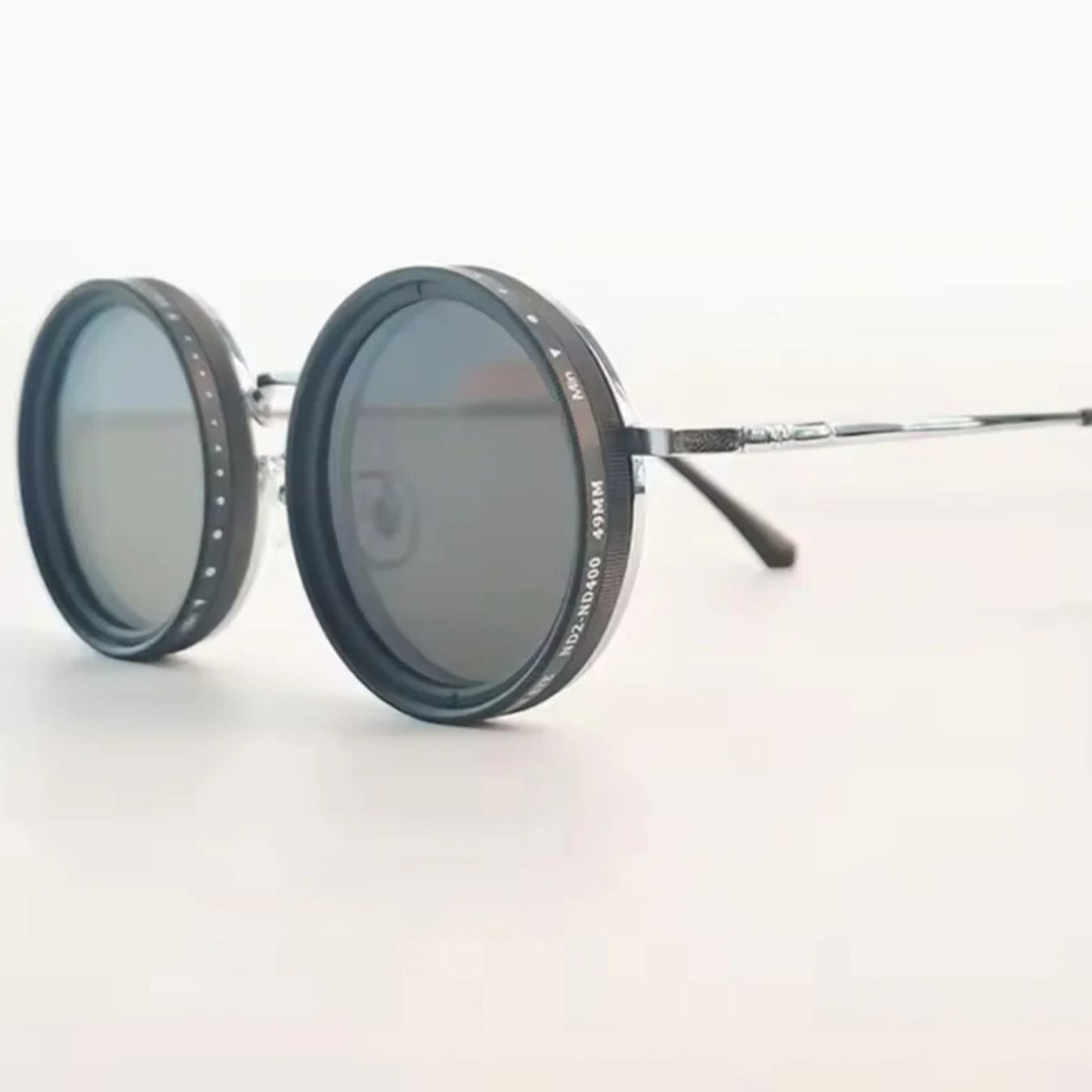 Unisex Polarized Round Sunglasses with Adjustable Light Filter and Metal Frame